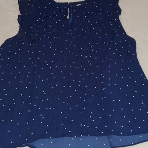 Navy blue and white polka-dot blouse